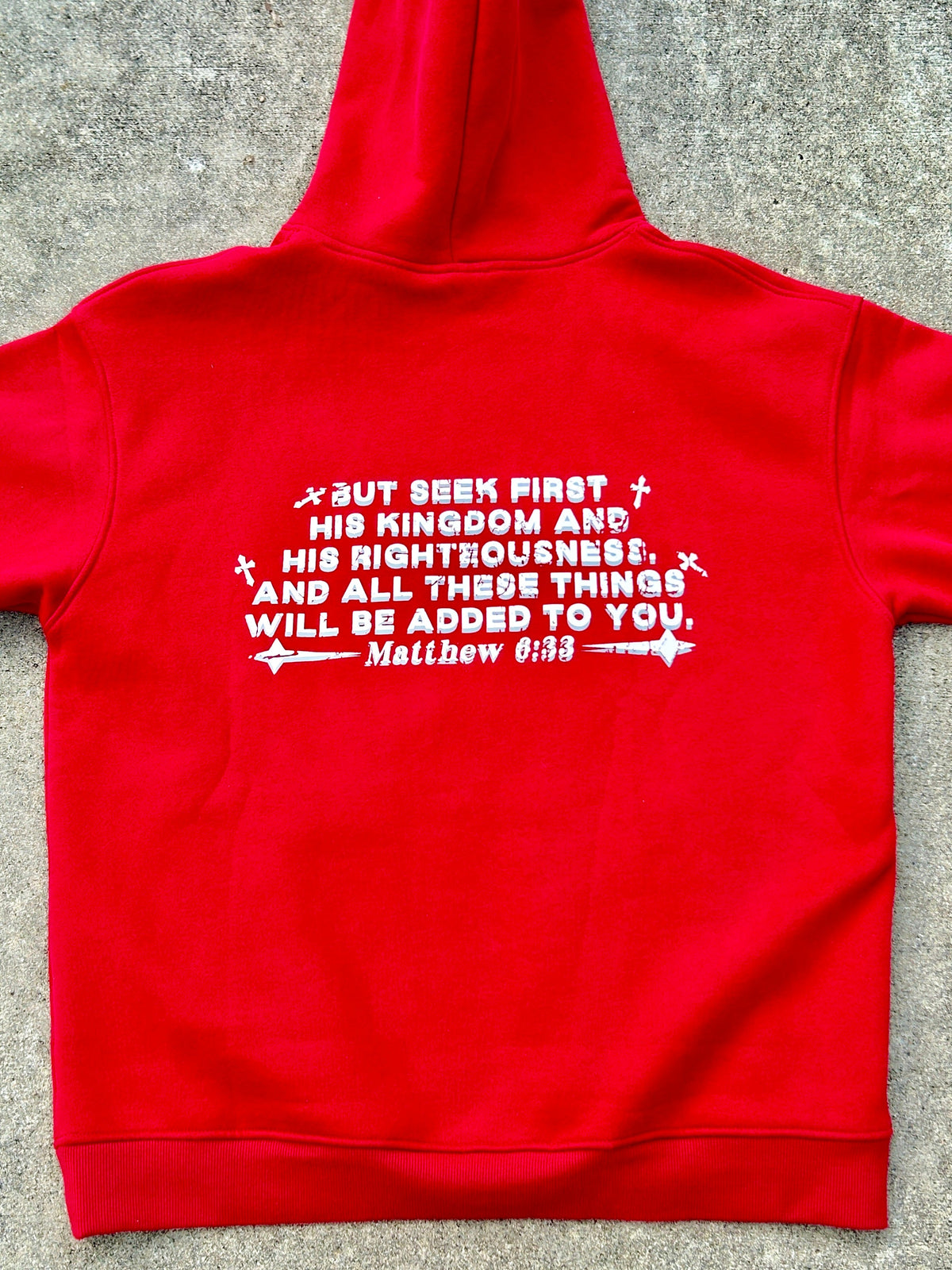 Red Christian hoodie with Matthew 6:33 on the back